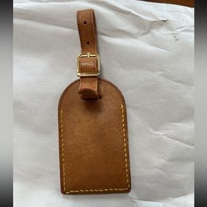 Louis Vuitton vachetta luggage tag 
Preowned 
Please see images for details